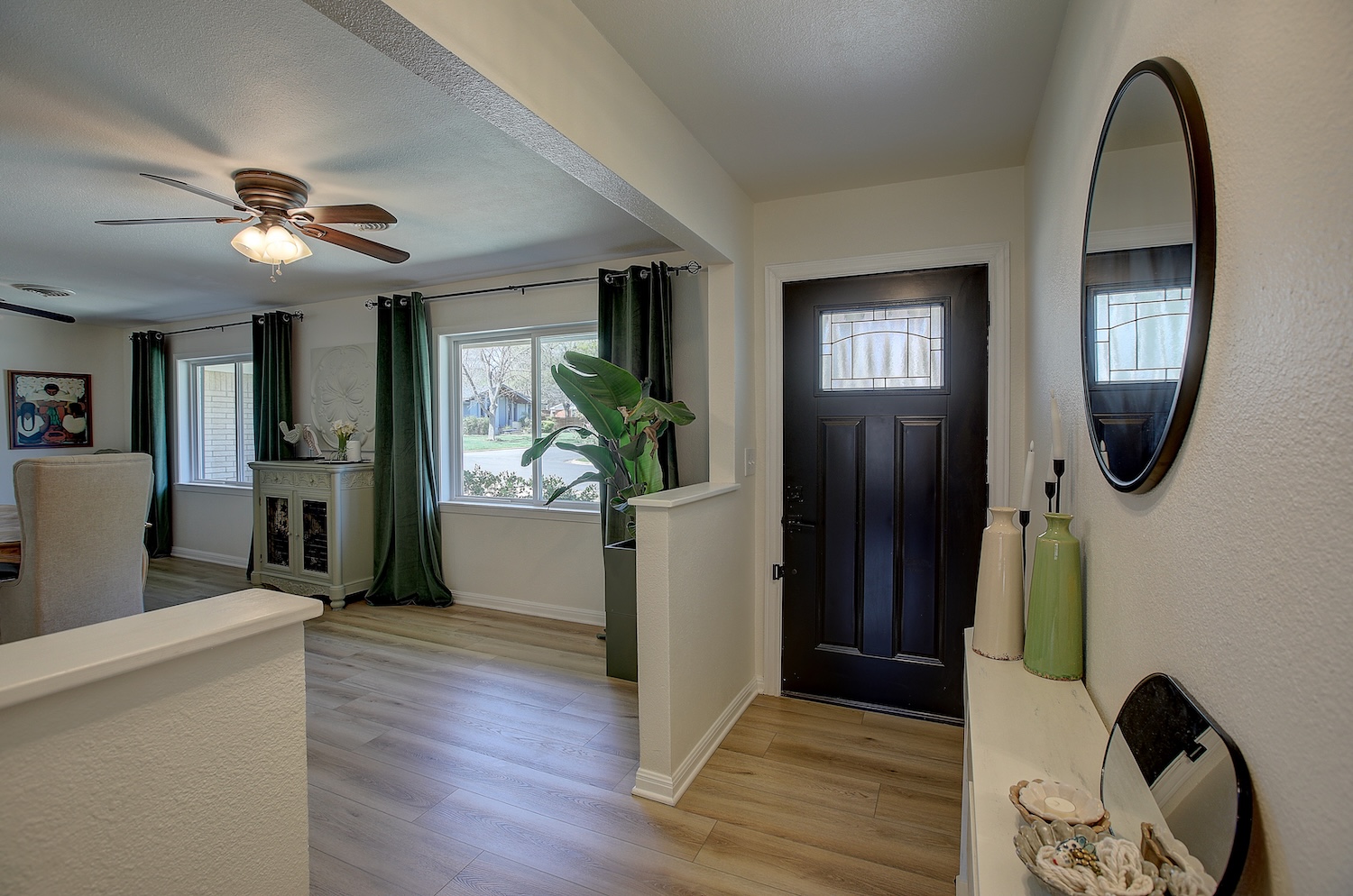 1902 East 18th Street Georgetown, TX 78626 - Photo 11 of 40 Natural light welcomes you in this foyer, with recent wood look vinyl flooring.