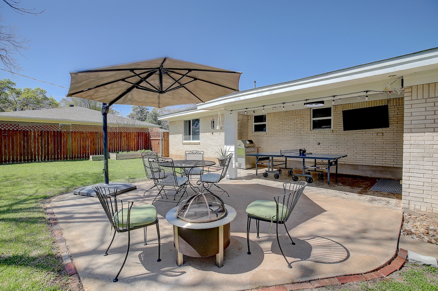 1902 East 18th Street Georgetown, TX 78626 - Photo 36 of 40 View of patio with outdoor dining area, a grill, and a fire pit