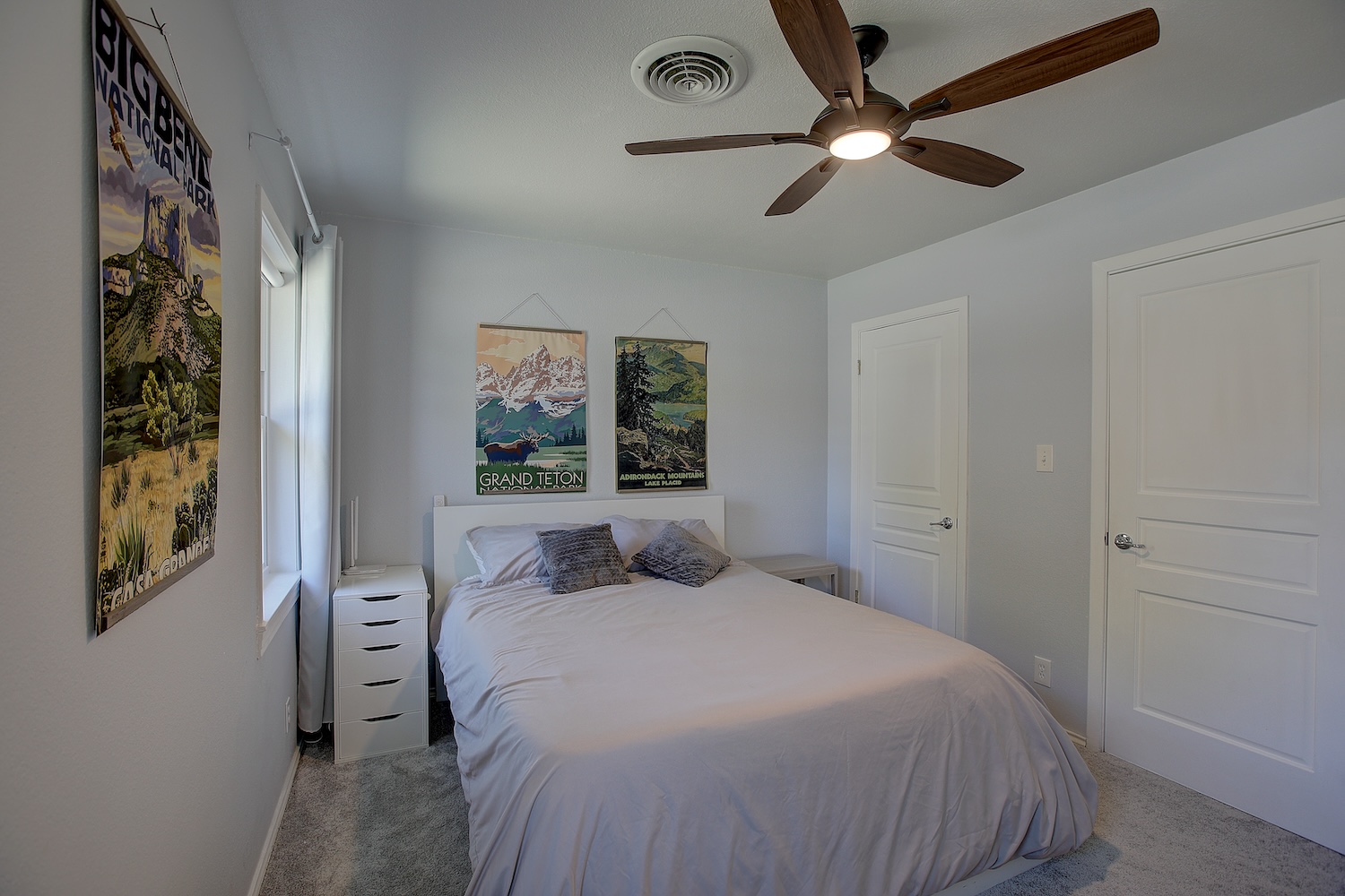 1902 East 18th Street Georgetown, TX 78626 - Photo 9 of 40 Bedroom with light carpet and ceiling fan