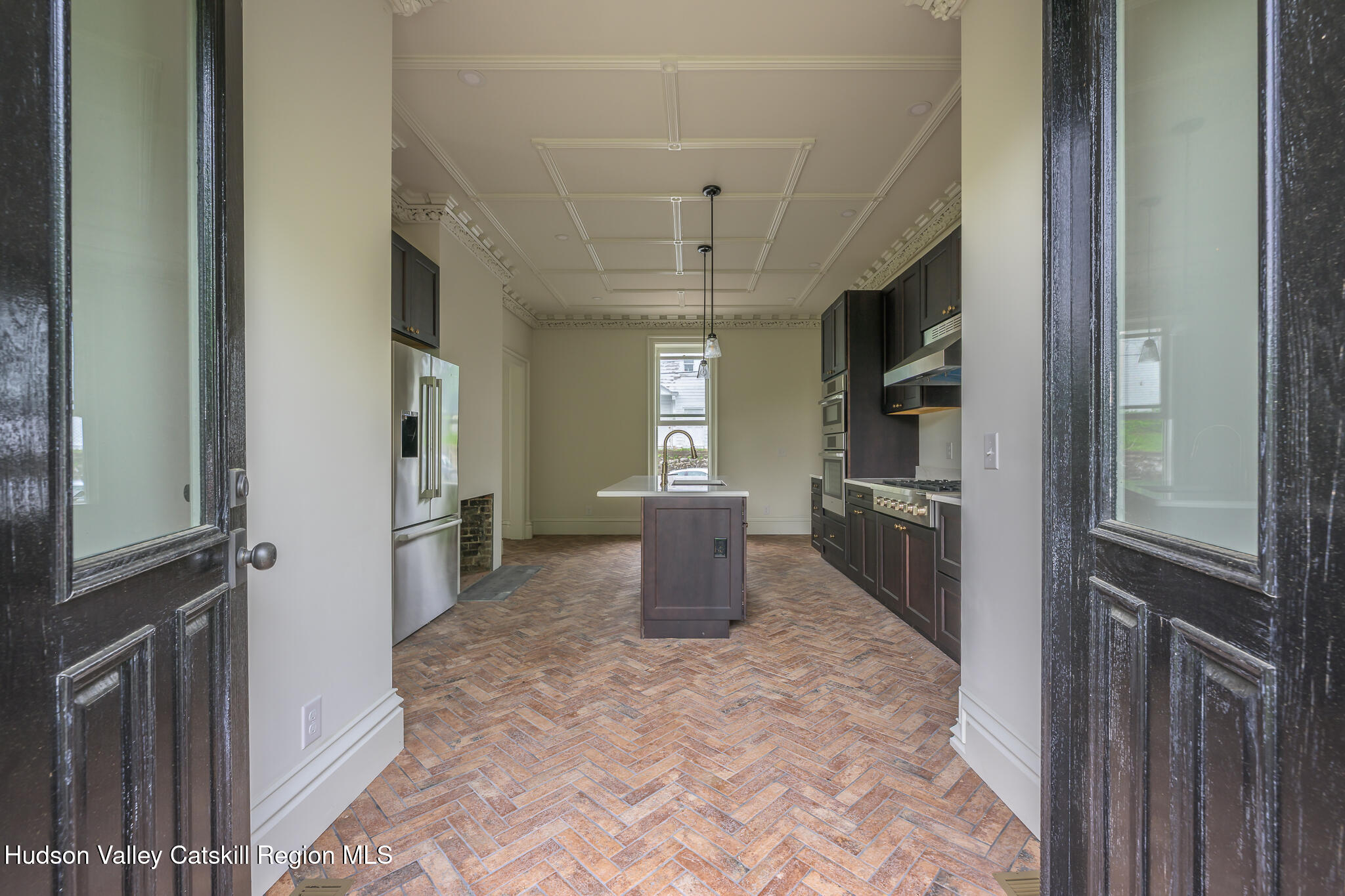 59 Allen Street Hudson, NY 12534 - Photo 24 of 59 a kitchen with a refrigerator and a sink