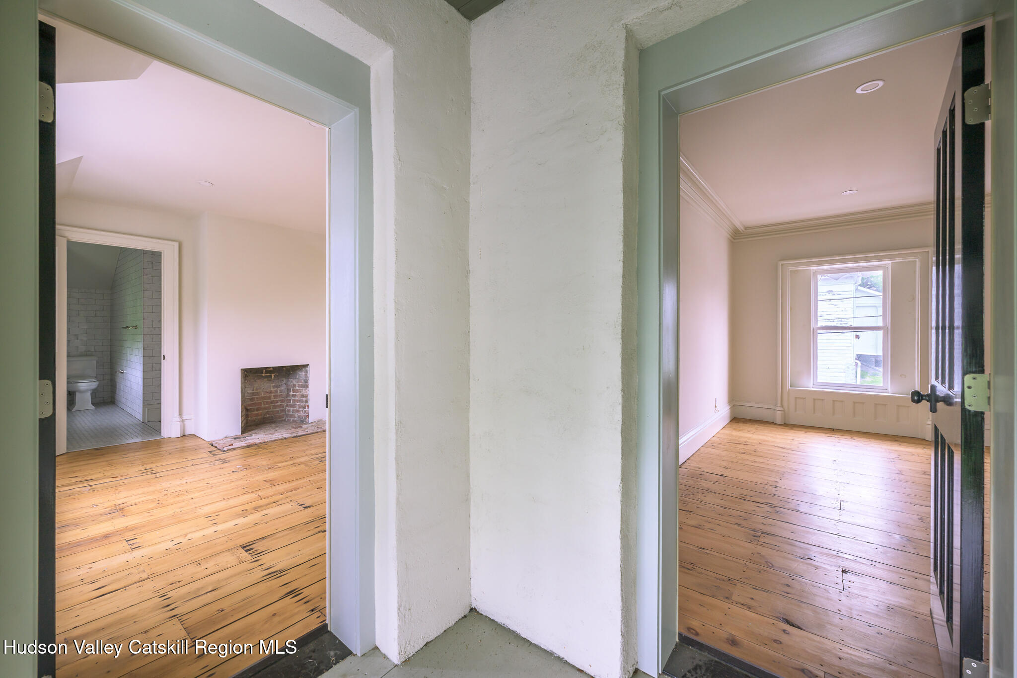 59 Allen Street Hudson, NY 12534 - Photo 41 of 59 a view of a hallway with wooden floor and a living room