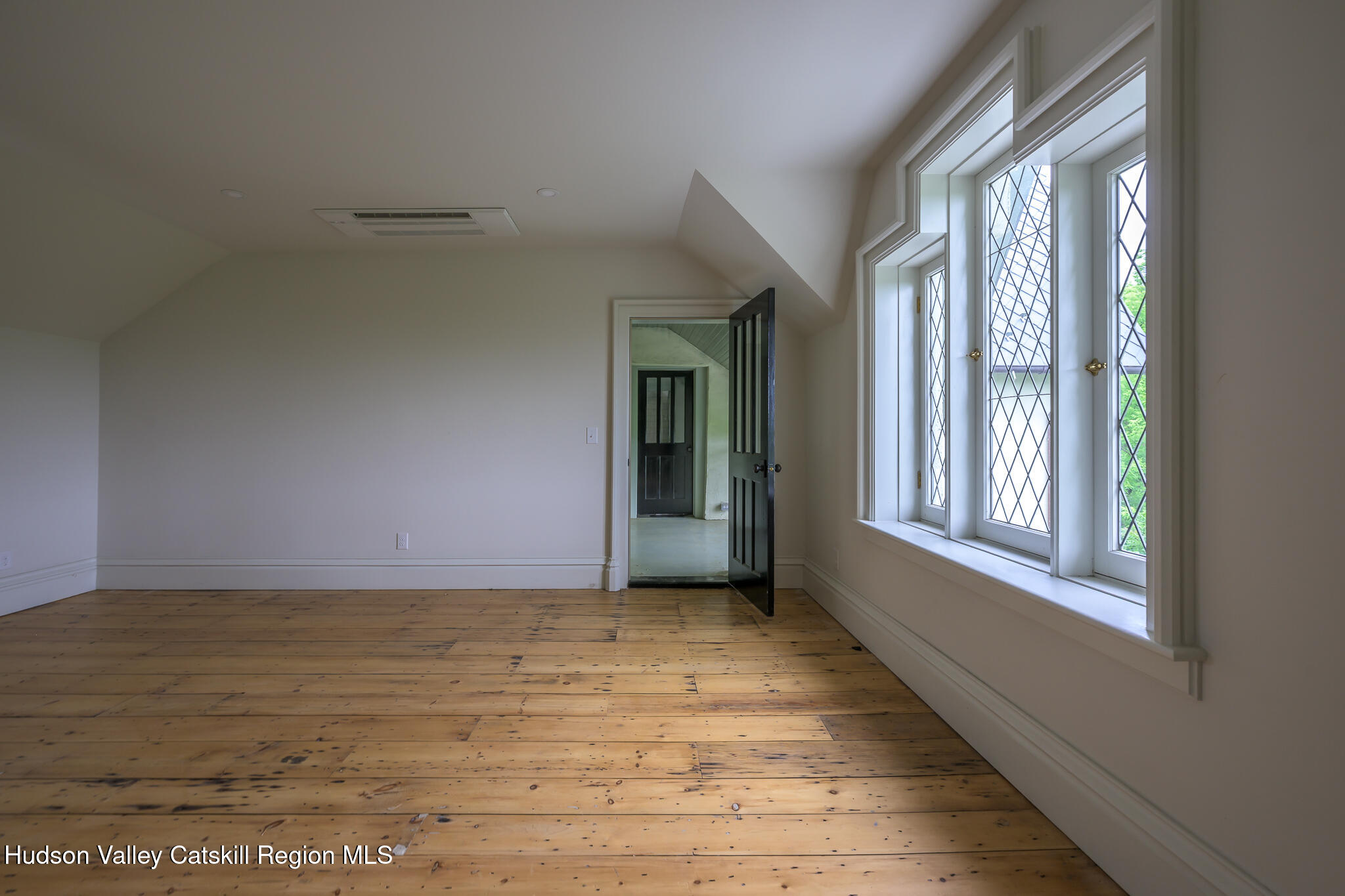 59 Allen Street Hudson, NY 12534 - Photo 42 of 59 a view of an empty room with a window