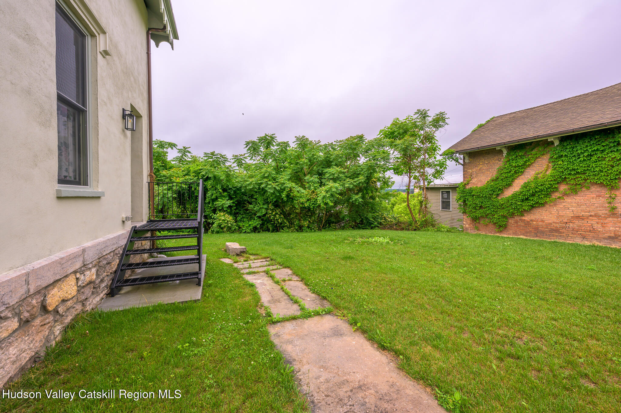 59 Allen Street Hudson, NY 12534 - Photo 7 of 59 a view of a back yard with a house