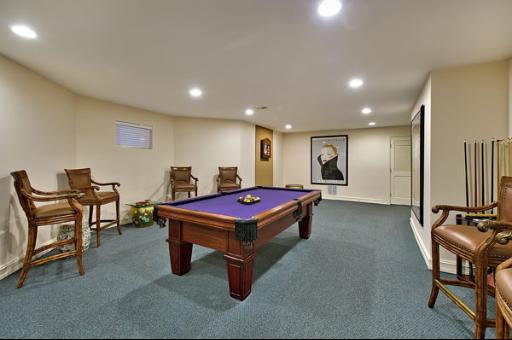 5662 South County Line Road Hinsdale, IL 60521 - Photo 13 of 16 a room with furniture pool table and windows