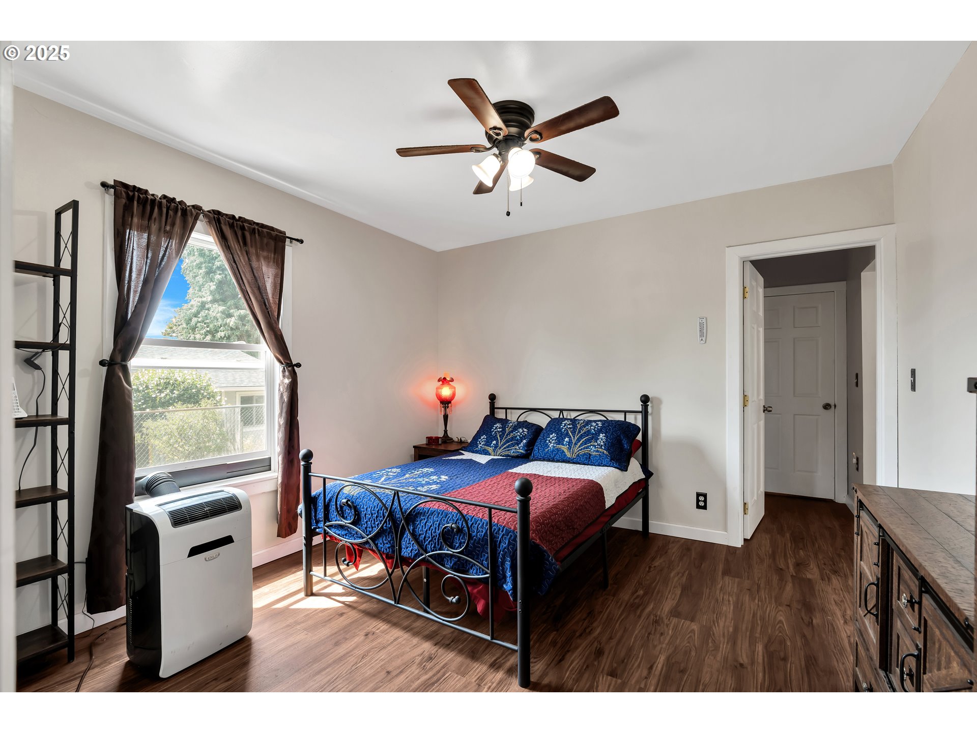 761 Southeast Polk Street Camas, WA 98607 - Photo 20 of 40 a bedroom with furniture and a window