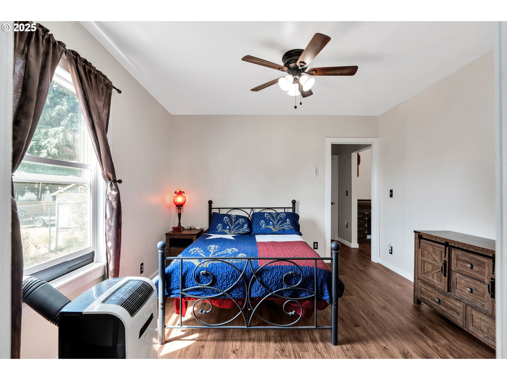 761 Southeast Polk Street Camas, WA 98607 - Photo 21 of 40 a bedroom with furniture and a window