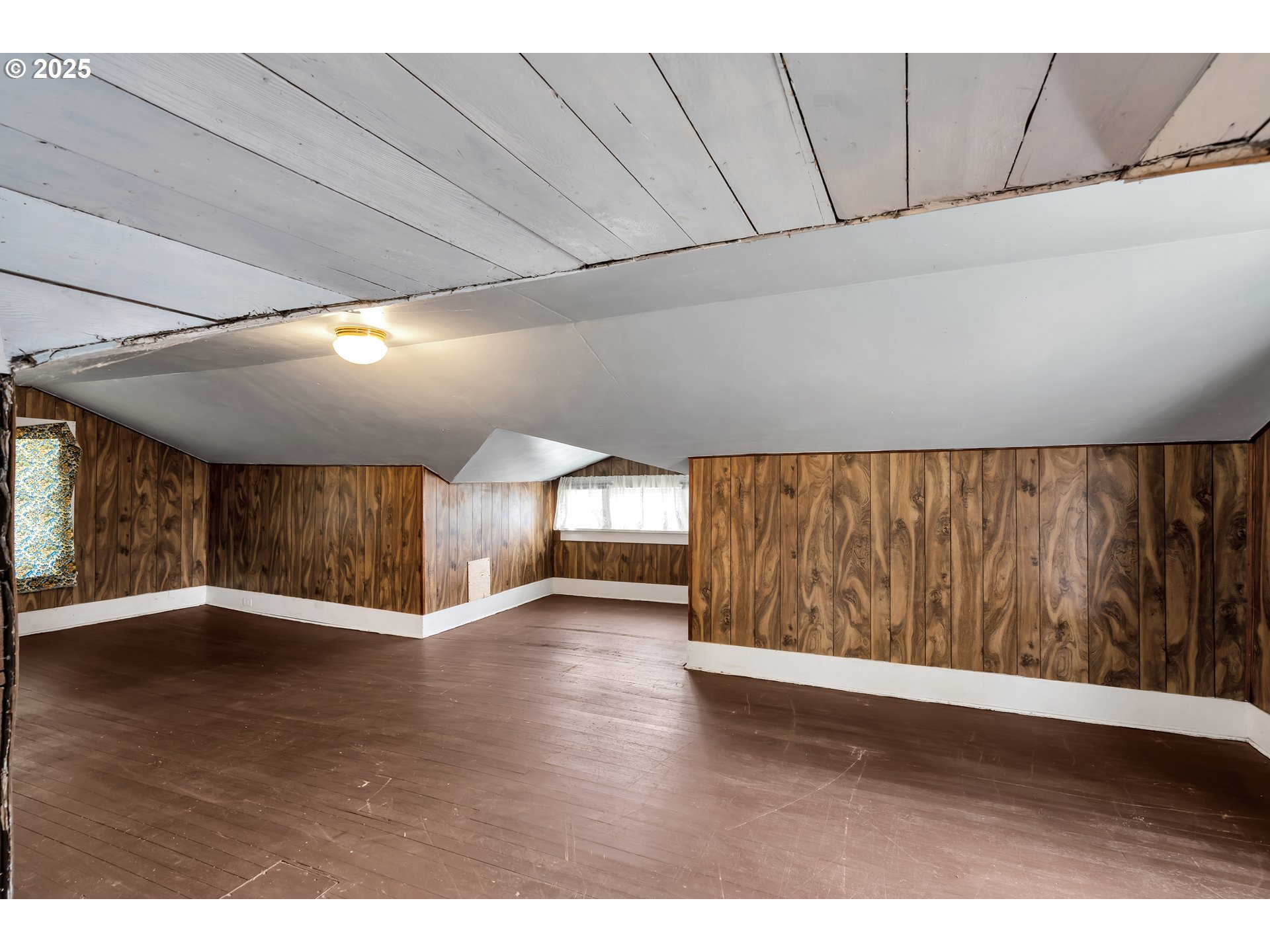 761 Southeast Polk Street Camas, WA 98607 - Photo 24 of 40 a view of an empty room with wooden floor