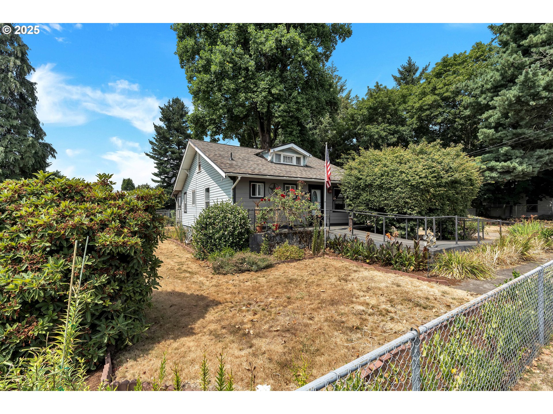 761 Southeast Polk Street Camas, WA 98607 - Photo 3 of 40 a view of a house with a yard