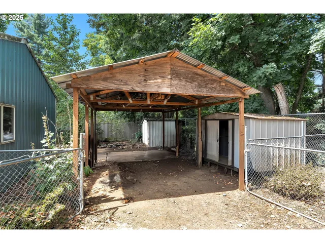 a view of a barn with a yard