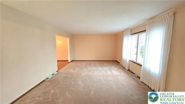 a bathroom with a toilet and a sink