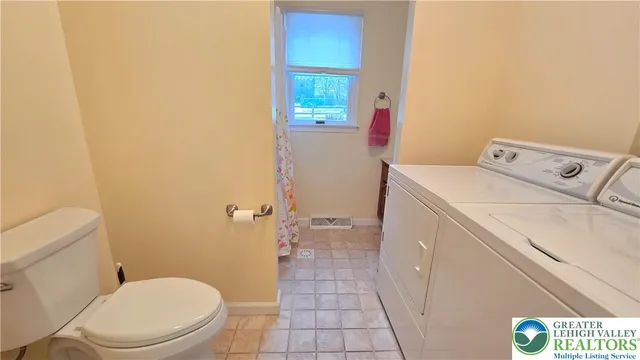 a bathroom with a sink a vanity and a mirror