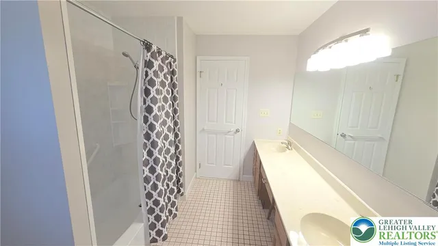 a view of a garden with a house