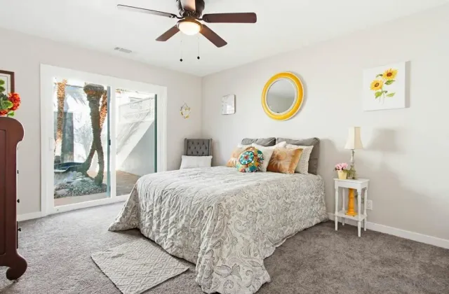 a bedroom with a bed and window