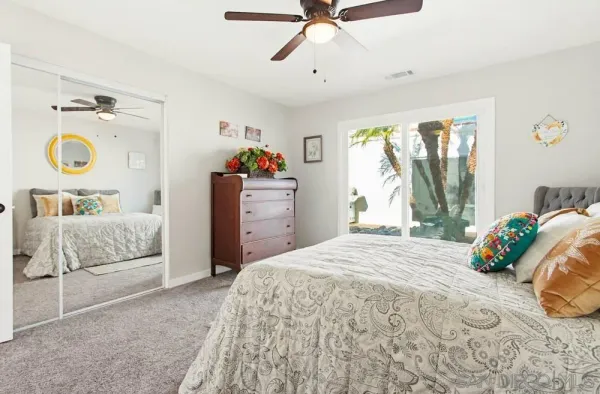 a bathroom with a toilet and a bathtub