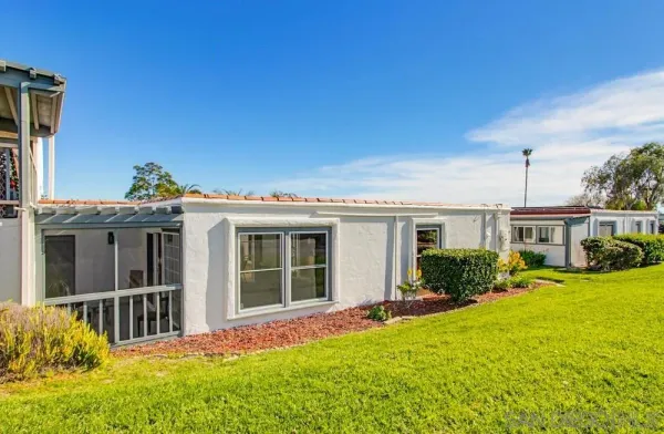 a house view with a garden space