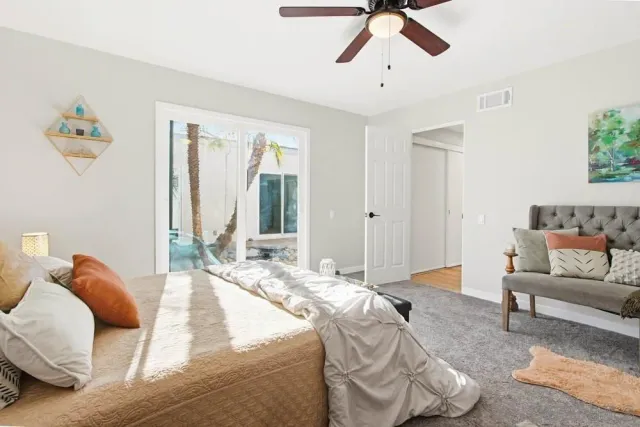 a bathroom with a double vanity sink mirror and