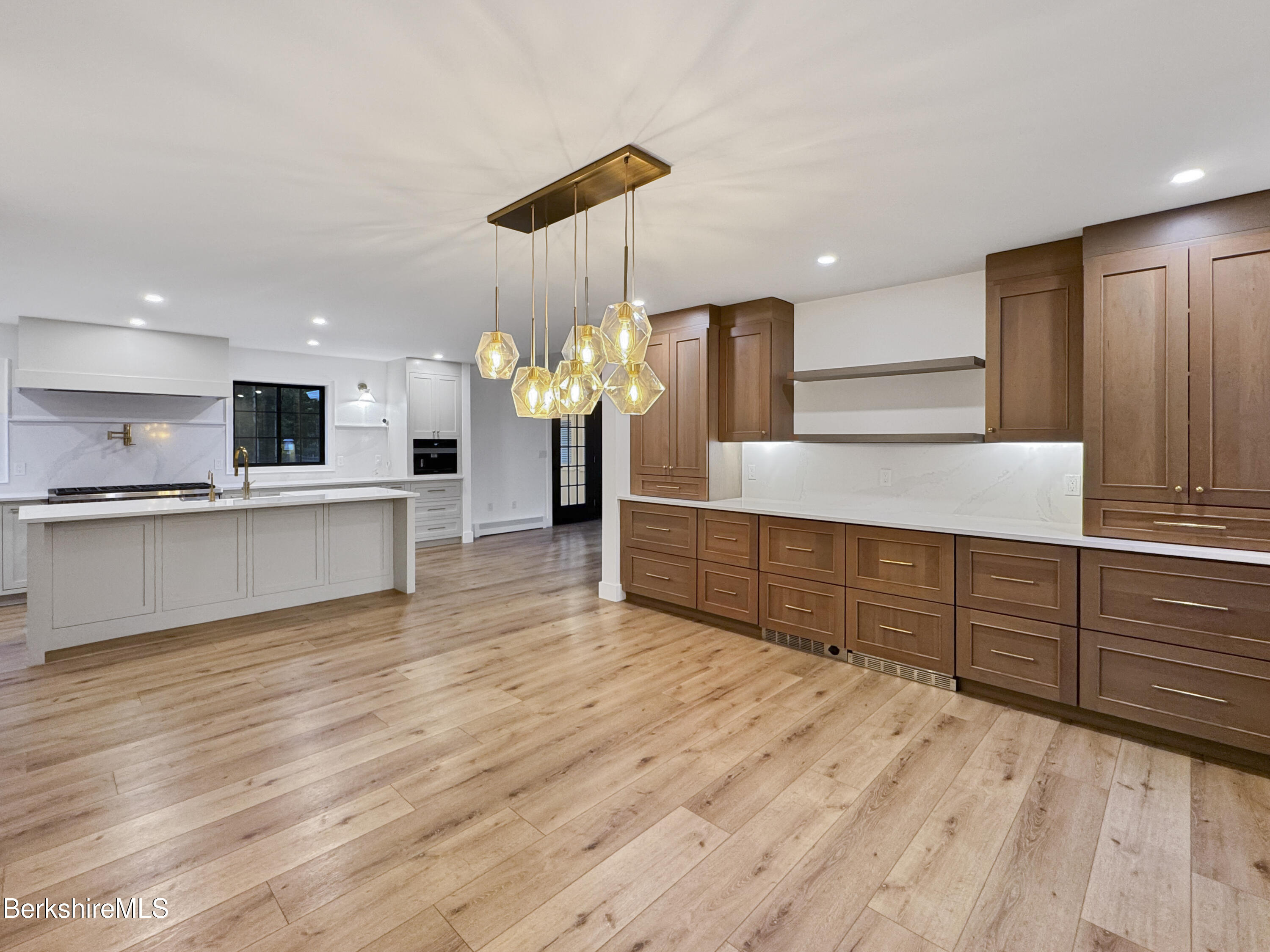 65 Johnson Road Dalton, MA 01226 - Photo 16 of 80 Custom cabinetry extends to dining area