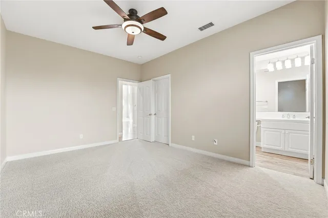 a utility room with sink dryer and washer