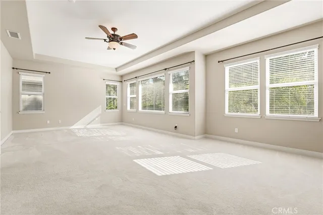 a bathroom with a shower sink vanity mirror and toilet