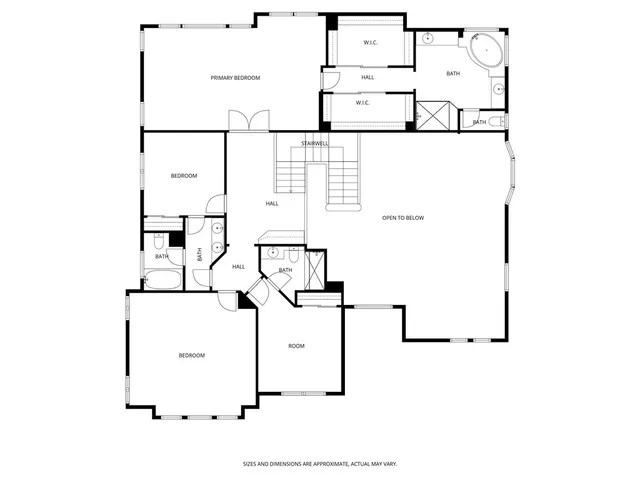 a living room with fireplace furniture and a large window