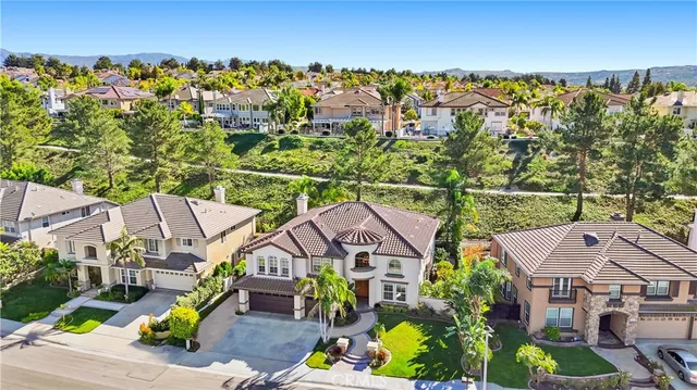 a view of swimming pool with outdoor seating and a pathway