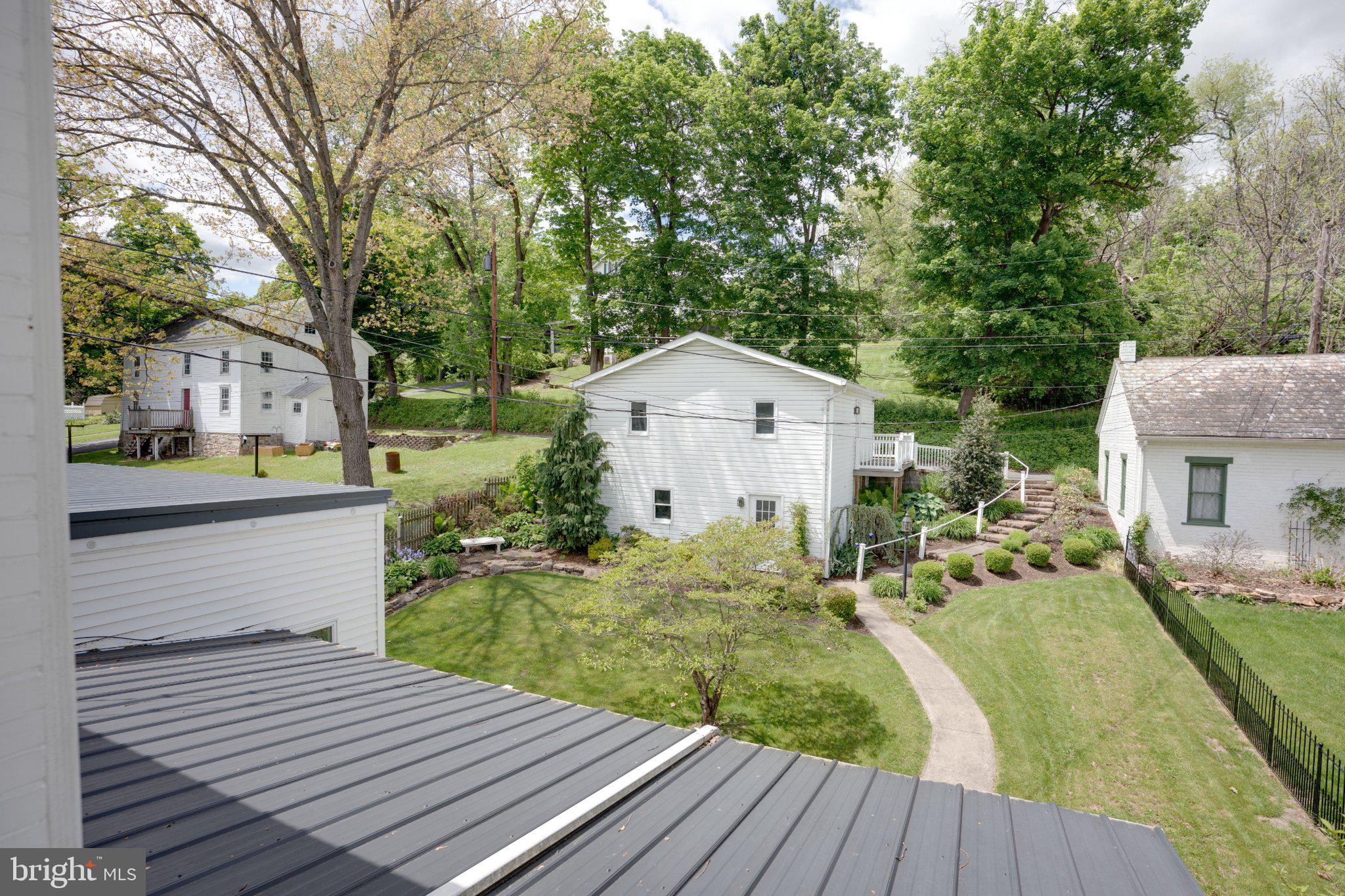 149 Walnut Street Reedsville, PA 17084 - Photo 59 of 83 Charming homes nestled in lush greenery.