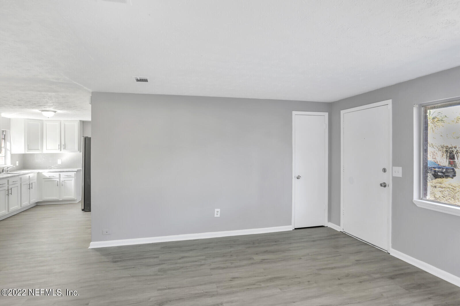 4444 Crossbow Road Jacksonville, FL 32208 - Photo 3 of 15 a view of an empty room and window