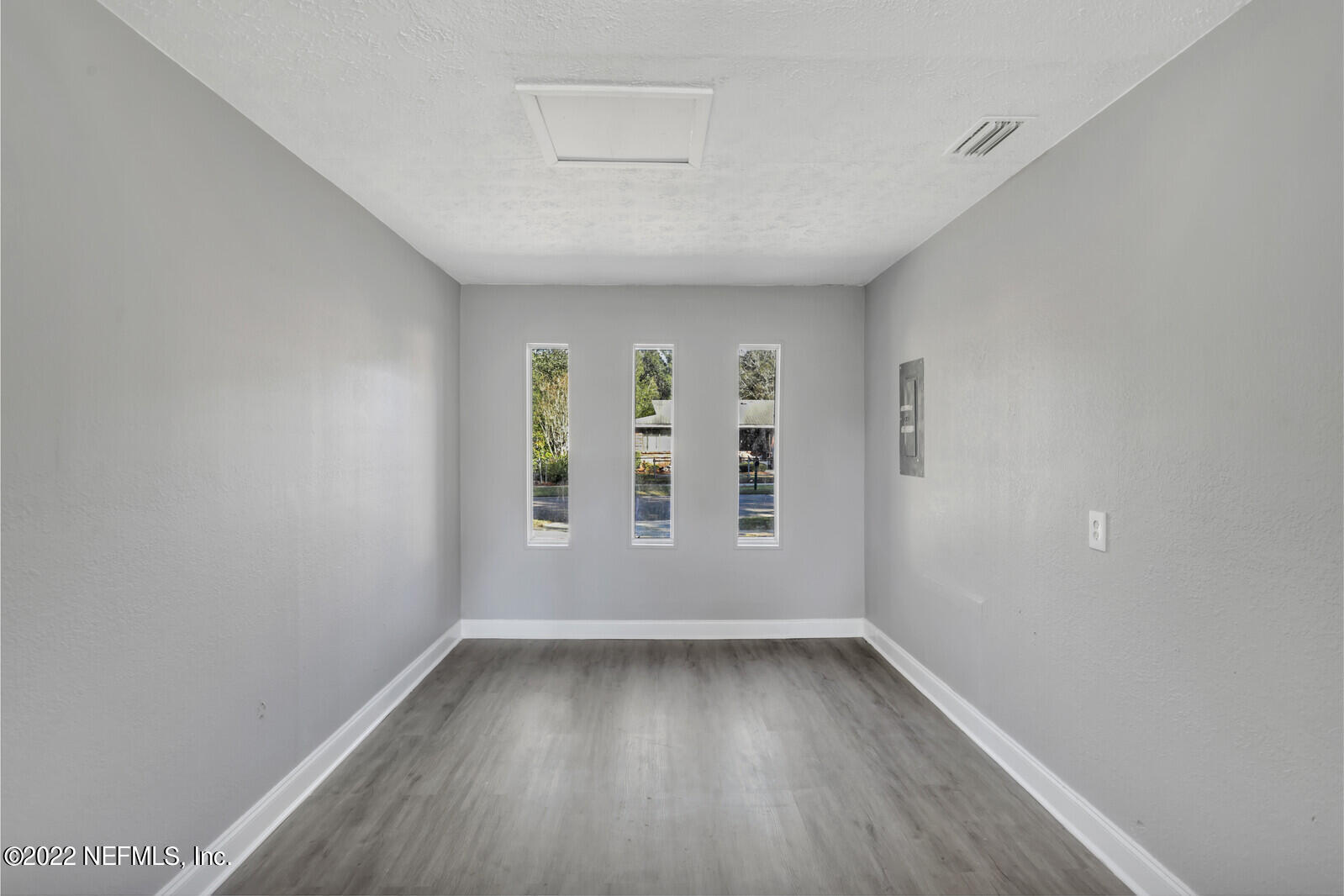 4444 Crossbow Road Jacksonville, FL 32208 - Photo 7 of 15 an empty room with a window