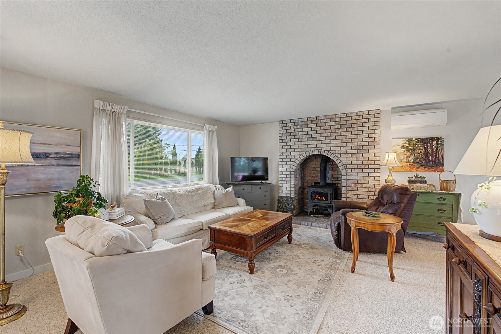 1611 Ham Hill Road Centralia, WA 98531 - Photo 5 of 40 a living room with furniture and a fireplace