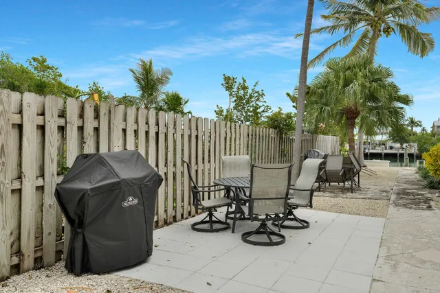 a backyard of a house with seating space