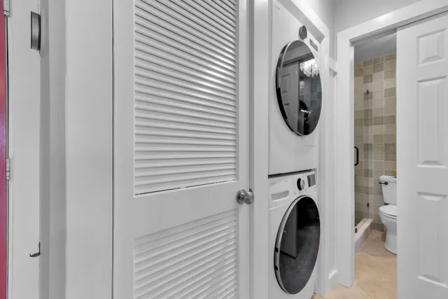 an aerial view of a house with a lake view