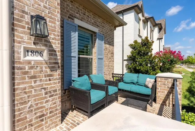 a building outdoor space with patio furniture