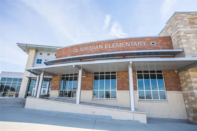 an aerial view of a pool patio and mountain view