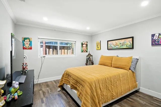 a bathroom with a shower and a sink