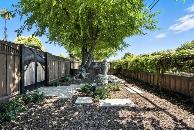 a outdoor living space with furniture and garden view
