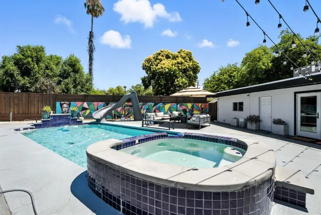 a view of backyard with green space