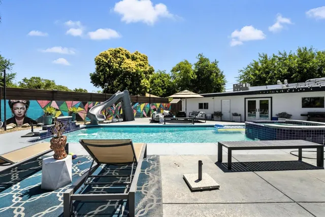 a backyard of a house with lots of green space