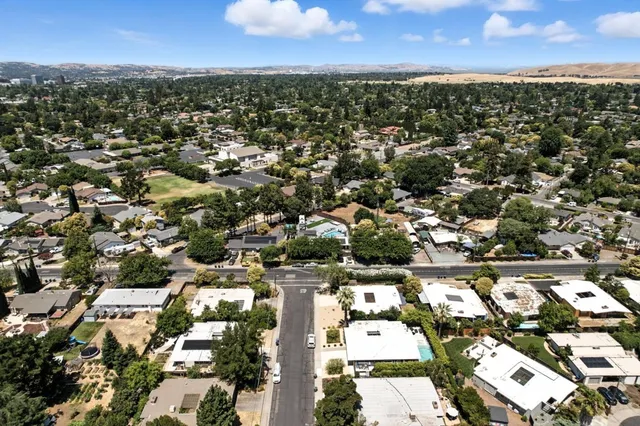 an aerial view of a city with lots of residential buildings