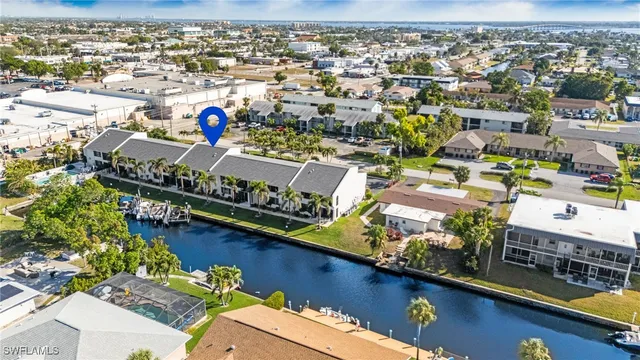a view of a lake with a palm trees