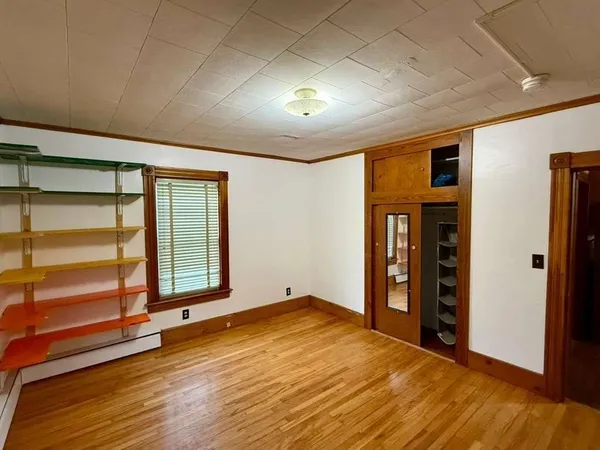 wooden floor and windows in an empty room