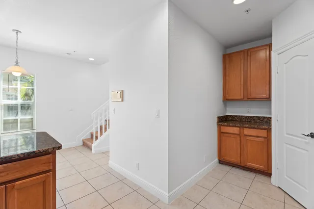 a view of a room with a window and a bathroom