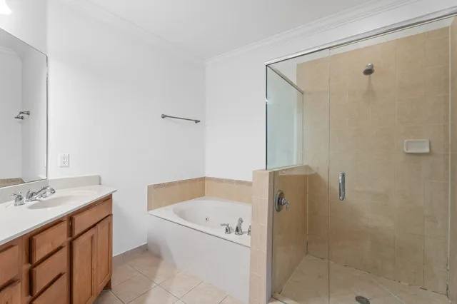 a bathroom with a toilet sink and a mirror