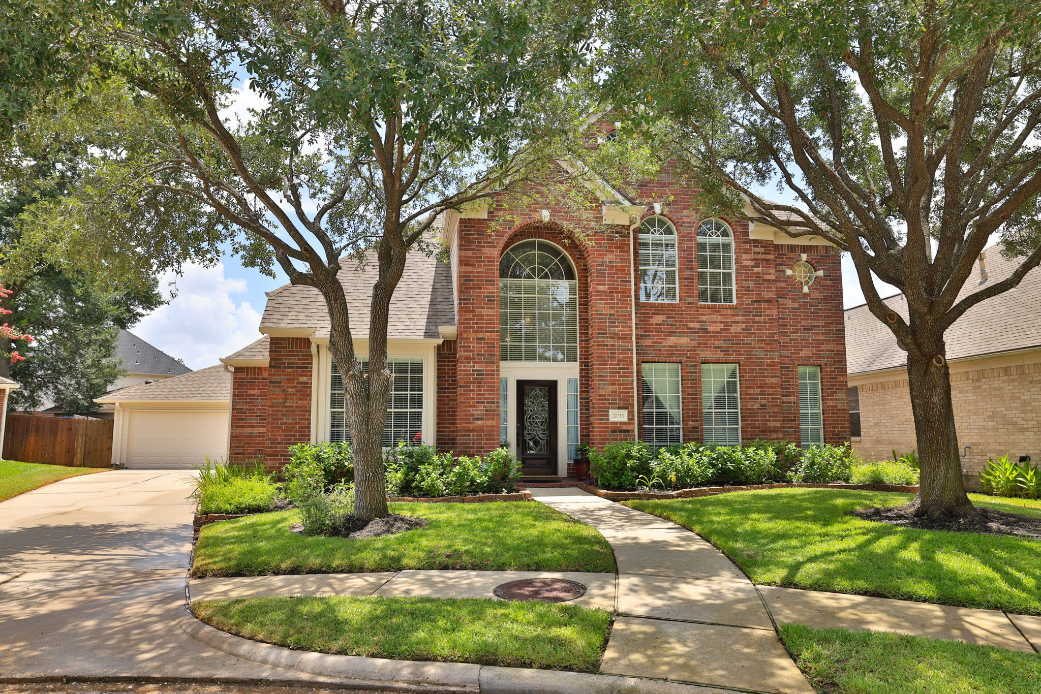 3711 Sapling Trail Court Spring, TX 77388 - Photo 1 of 50 a front view of a house with garden