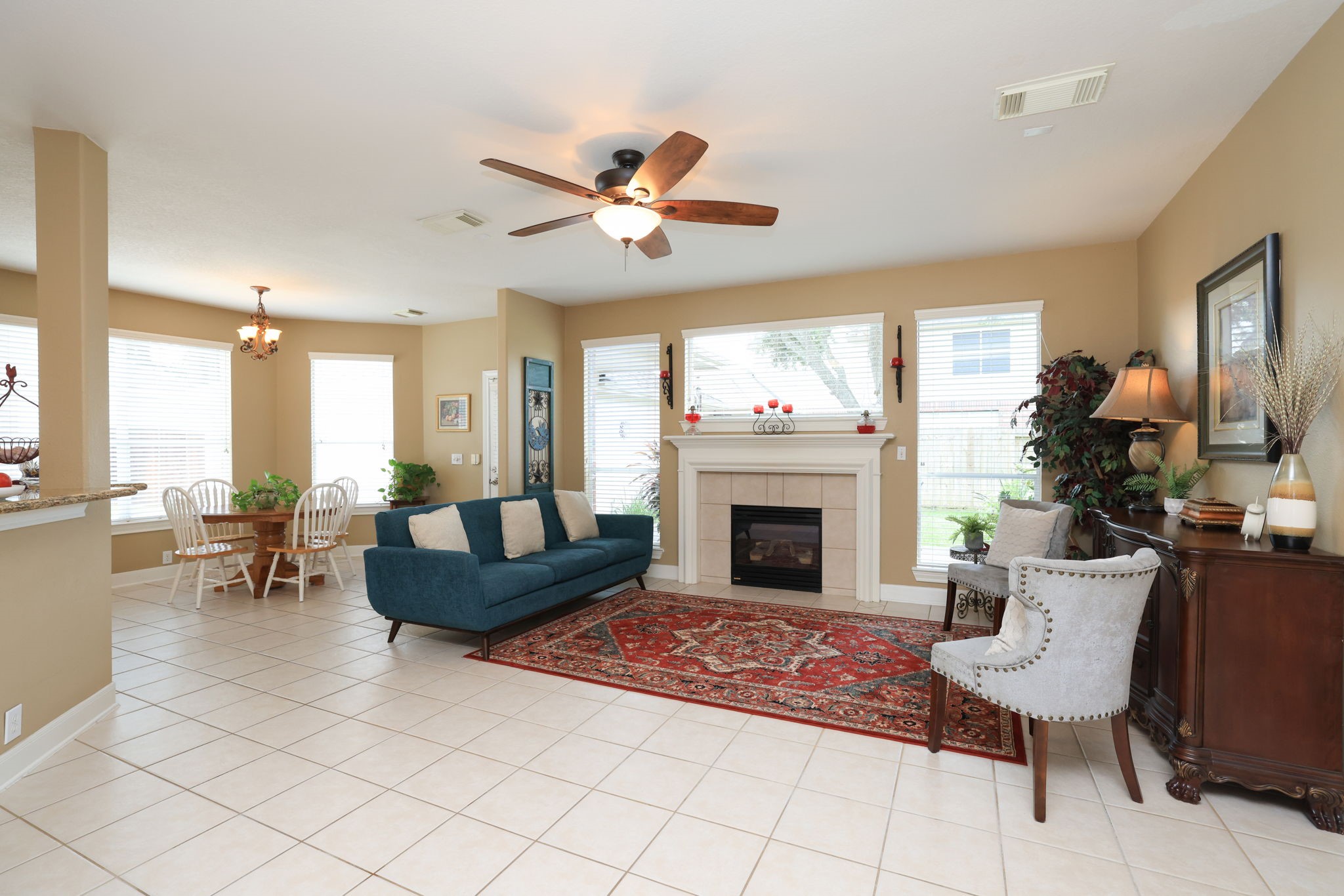 3711 Sapling Trail Court Spring, TX 77388 - Photo 12 of 50 a living room with furniture a fireplace and a large window