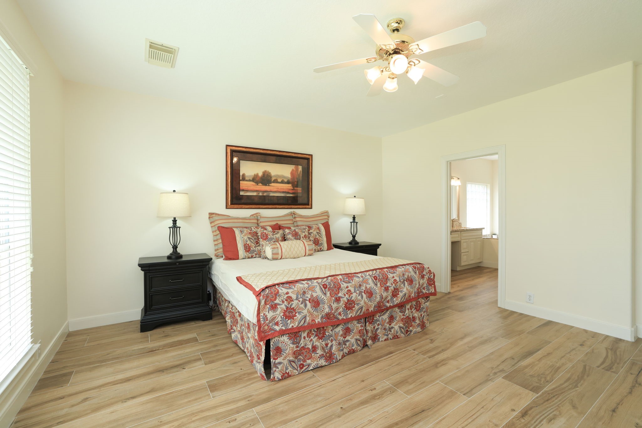 3711 Sapling Trail Court Spring, TX 77388 - Photo 22 of 50 a bedroom with a bed and a chandelier
