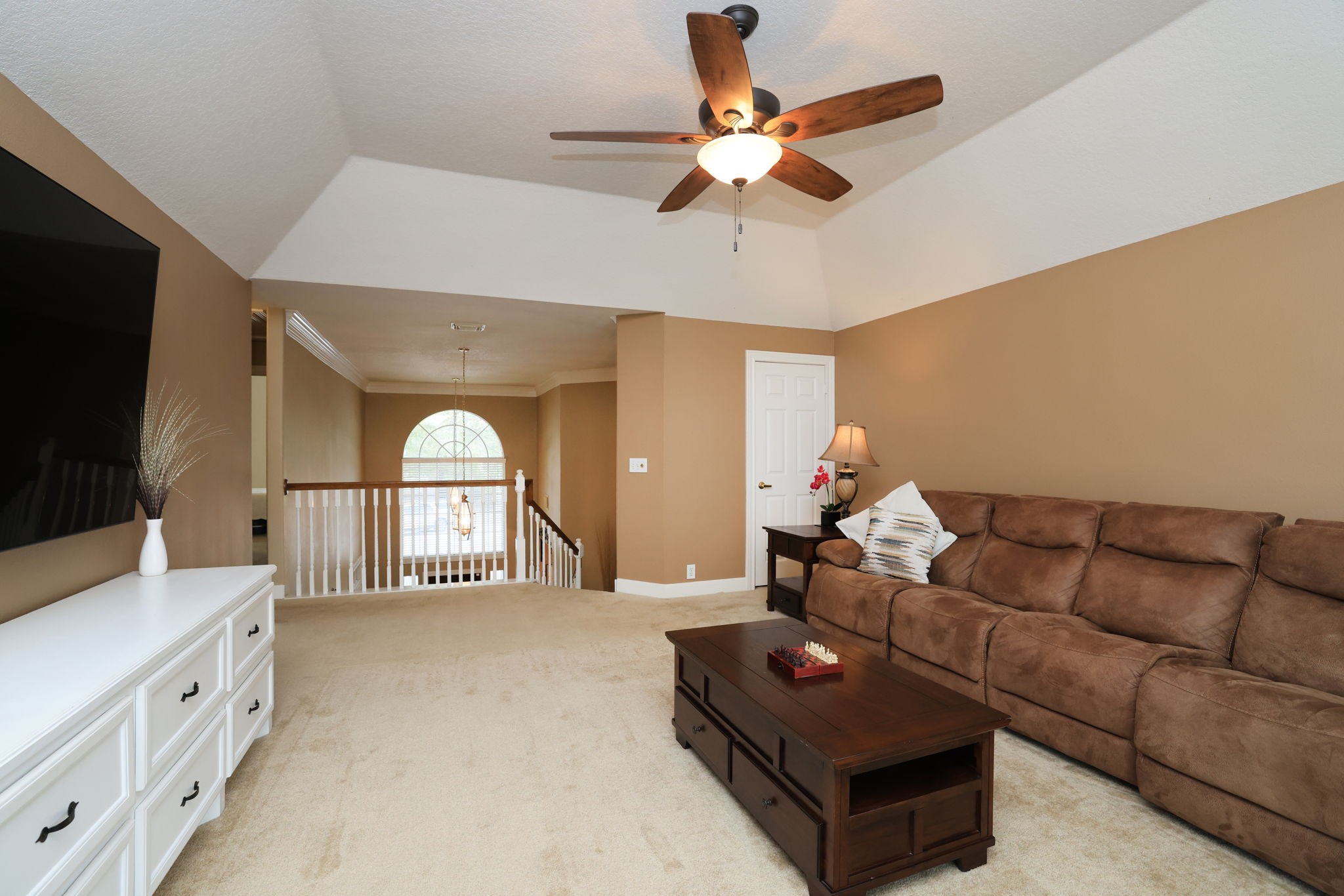 3711 Sapling Trail Court Spring, TX 77388 - Photo 29 of 50 a living room with furniture and a flat screen tv