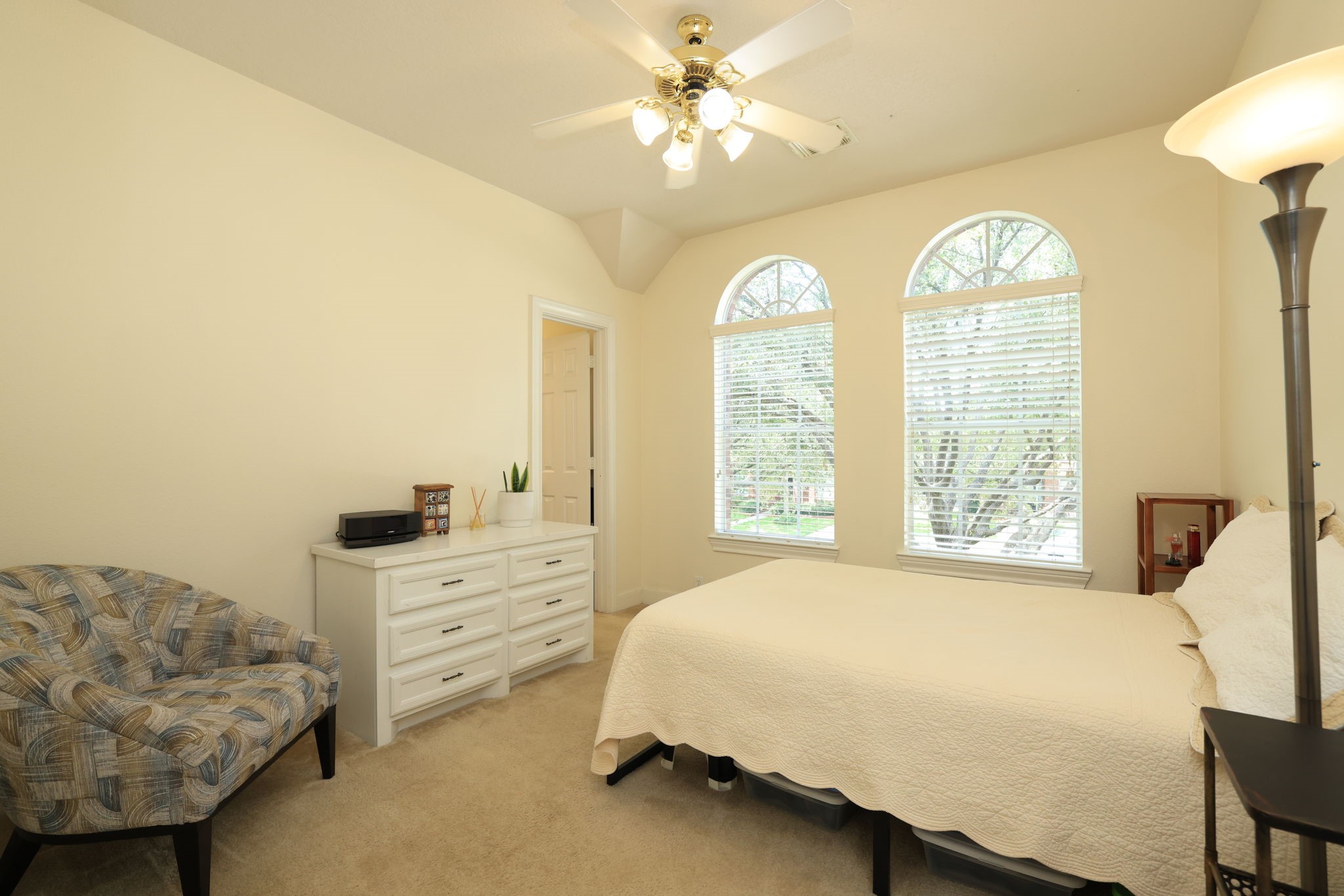 3711 Sapling Trail Court Spring, TX 77388 - Photo 30 of 50 a spacious bedroom with a bed and a chandelier