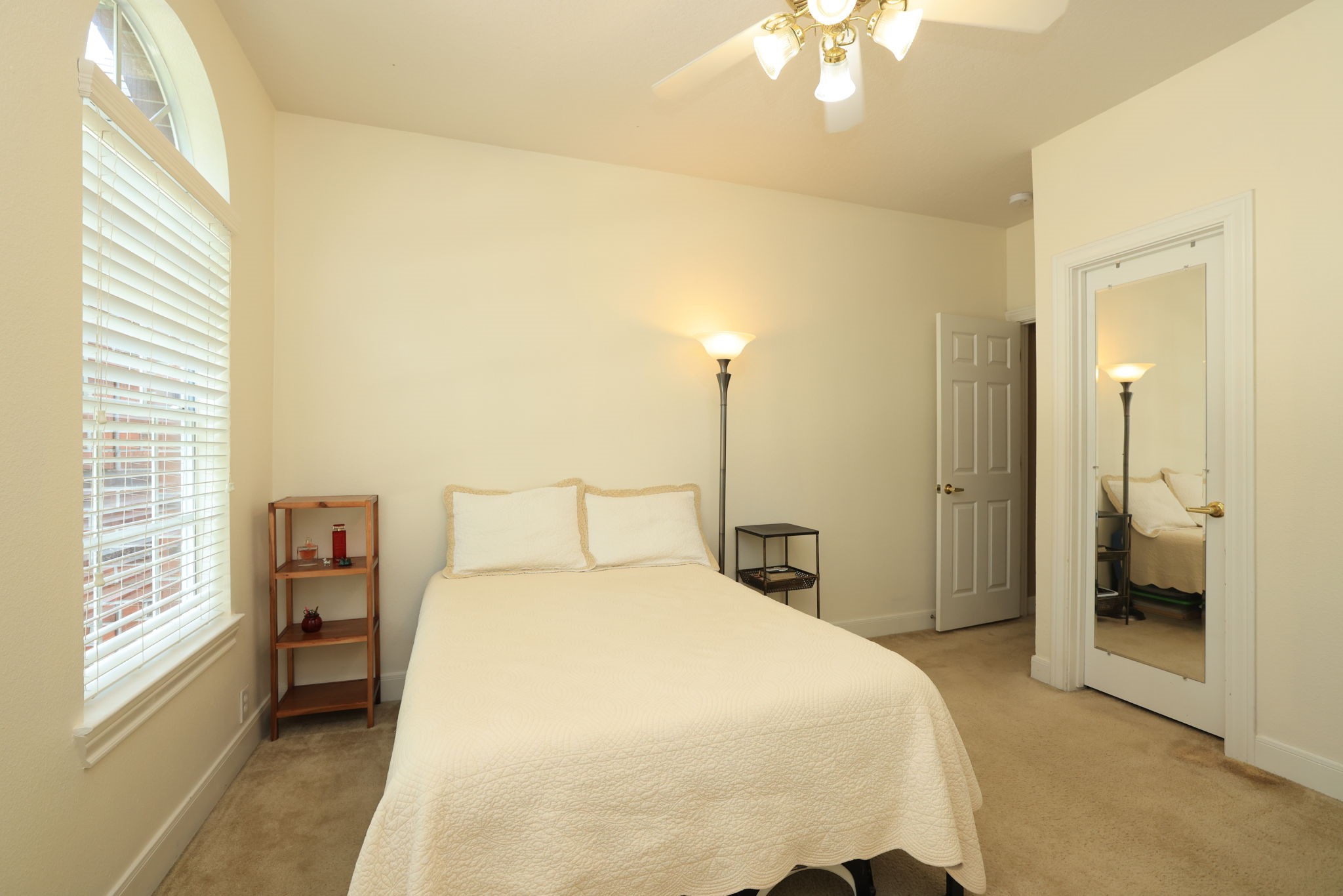 3711 Sapling Trail Court Spring, TX 77388 - Photo 31 of 50 a bedroom with a bed and a chandelier