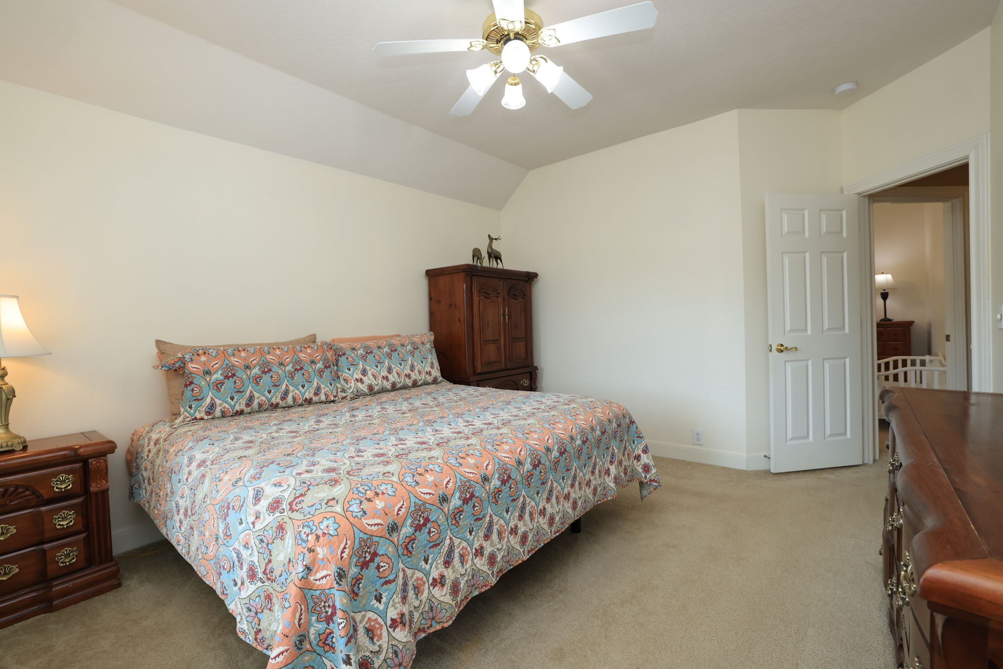 3711 Sapling Trail Court Spring, TX 77388 - Photo 38 of 50 a bedroom with a bed and a chandelier