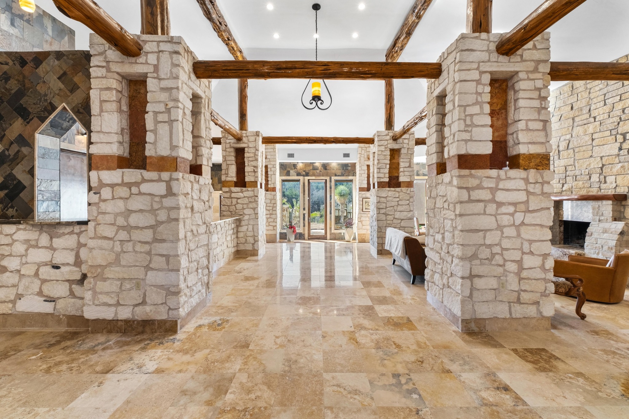 340 Barton Ranch Road Dripping Springs, TX 78620 - Photo 9 of 39 a view of a entryway with brick walls